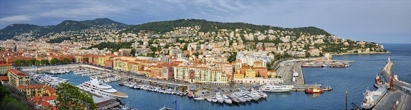 Panorama of Old Port of Nice with luxury yacht boats from Castle Hill, France,