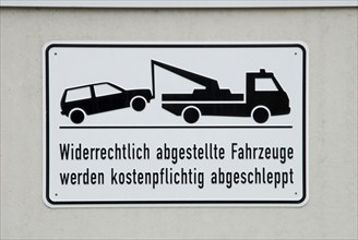 Traffic sign 'car will be towed away', illegally parked vehicles will be towed away at the owner's