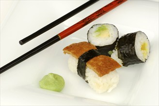 Sushi on tray with chopsticks, wasabi paste, Japanese food, chopsticks, chopsticks