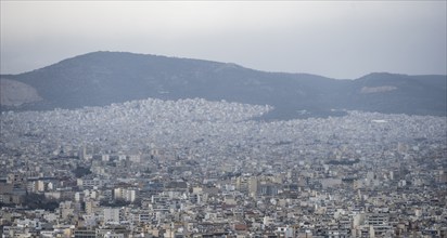 View over the sea of houses of Athens, Athens, Attica, Greece, Europe