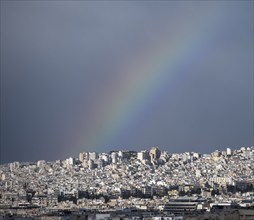 View over the sea of houses of Athens, with rainbow, Athens, Attica, Greece, Europe