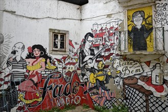 Graffito or mural painting, fado musician, Alfama quarter, Lisbon, Portugal, Europe