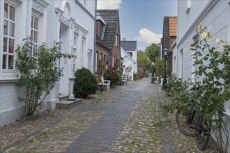 Alley with historic capitol houses, Wyk, Föhr, North Frisian Island, North Frisia,