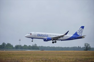 MINSK, BELARUS, JUNE 15, 2018: Belavia belarusian airlines flight Embraer ERJ-175 plane landing on