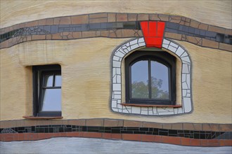 Detail with two windows of the Hundertwasserhaus Waldspirale, red, frame, Darmstadt, Bergstrasse,