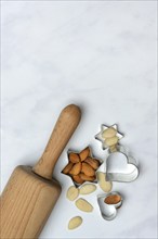 Almonds and biscuit cutters for biscuits, almond kernels