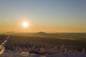 View from the snow-covered Fichtelberg to the Ore Mountains