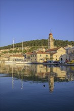 Church of St. Jerome of Stridon and sailing boats, Pucišca, Split-Dalmatia County, Croatia, Europe