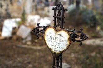 Cross on gravestone, cemetery in Puimoisson, Provence, region Provence-Alpes-Côte d'Azur,