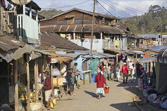 Malagasy people shopping in the main street of the town Andasibe, Alaotra-Mangoro, Madagascar,