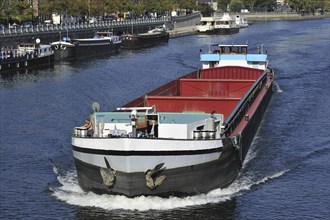 Empty inland vessel, canal barge on the river Meuse at Namur, Belgium, Europe