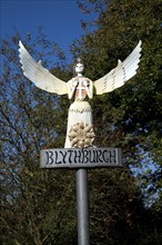 Village sign angel, Blythburgh, Suffolk, England, United Kingdom, Europe