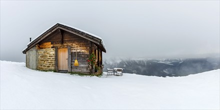 Lovingly decorated mountain hut, wooden hut, alpine hut, picturesque, broom, tourism, travel,