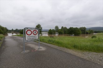 Symbolic image extreme weather, global warming, climate change, information board, flood retention