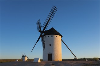 A large white windmill stands out clearly against a clear blue sky, Campo de Criptana, Ciudad Real