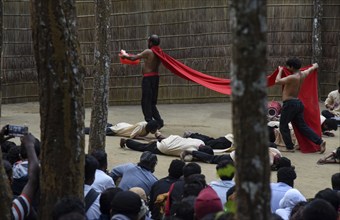 People enjoying a drama during 'Under The Sal Tree' Theatre Festival on December 15, 2021 in