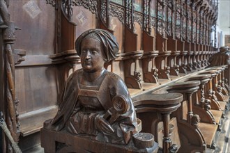 Figure on the late Gothic choir stalls from 1507, St Martin, Memmingen, Bavaria, Germany, Europe