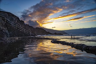 Sunset at the natural swimming pool La Maceta, El Hierro, Canary Islands, Spain, Europe