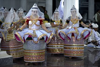 Artistes enacting the role of Gopi as they perform Manipuri Raas Leela Dance in Imphal, Manipur,