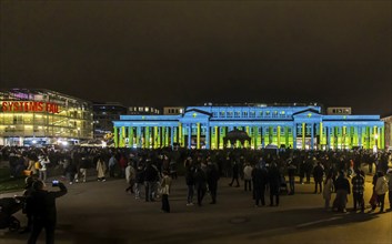 Stuttgart lights up. Long shopping night in the city centre with a light show. The Königsbau is