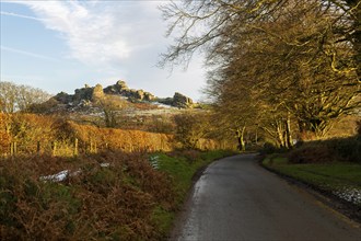 Autumn landscape of Hound Tor, road near Swallerton Gate, Dartmoor national park, north Devon,