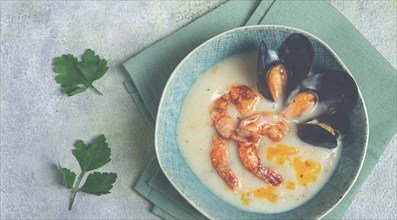 Cream soup, chowder with mussels and shrimp, American cuisine, homemade, no people