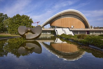 House of World Cultures with sculpture Butterfly by Henry Moore and reflection on the water surface