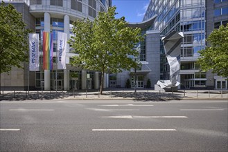 DZ Bank flags, rainbow flag and the sculpture Inverted Collar and Tie by Claes Oldenburg in front