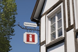 Tourist Information, sign on half-timbered façade, Soest, North Rhine-Westphalia, Germany, Europe