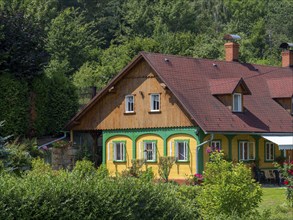 Colourful old half-timbered house, log construction, half-timbered, restored, Lusatian Mountains,