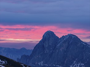 Peitlerkofel under red illuminated clouds, Vilnöss Valley, Dolomites, South Tyrol, Italy, Europe