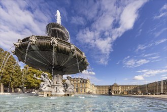 Palace square with New Palace. Fountain with fountain bowl. Place of interest in Stuttgart,