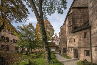 Cemetery of St Nicholas and St Ulrich Church, behind the castle Hallerschloss, Kirchenberg 15,