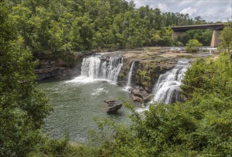 People playing on the rocks above the Little River Falls in Little River Canyon Falls Park near Ft.