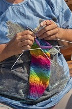 Woman knitting, colourful jumper, detail, Wustrow, Darß, Mecklenburg-Vorpommern, Germany, Europe