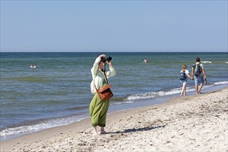 Elderly woman photographed on the beach, Darßer Ort, Born a. Darß, Mecklenburg-Vorpommern, Germany,