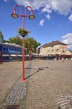 Lantern and café on the Neumarkt in Datteln, Ruhr area, Recklinghausen district, North