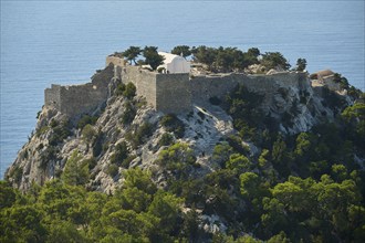 An old castle on a rocky hill overlooking the sea, Kastro Monolithou, Monolithos Castle, rock