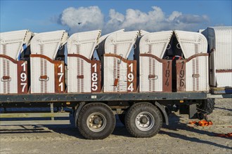 Beach chairs are transported away at the end of the season, beach chair, tractor, beach, season,