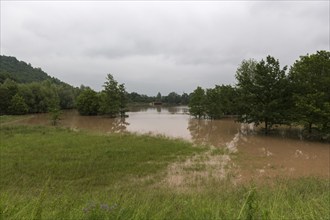 Symbolic image Extreme weather, global warming, high climate change, water retention basin, flood