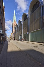 Modern architecture with the Peek & Cloppenburg shop, fashion shop, St. Marien zu Lübeck church,