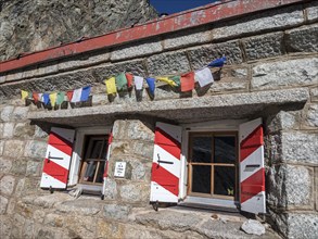 Mountain hut Cabane de l'A Neuve, located on a steep rock formation, near La Fouly, Val de Ferret,