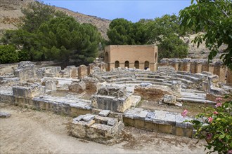 Overview of ruins of historic Roman amphitheatre from antiquity in excavation site remains of