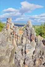 Heads carved into rocks at Enchanted Castle, Sciacca, Agrigento district, Sicily, Italy, Europe