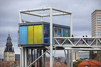 Marollescenece, art installation The Cube, coating of the windows with translucent dichroic films,