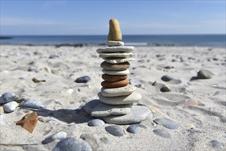 Stone pile on the sandy beach of the offshore island of Heligoland, Schleswig-Holstein, Germany,