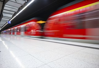 Underground arriving S-Bahn, train, class 420 in traffic red, platform, stop, Schwabstraße station,