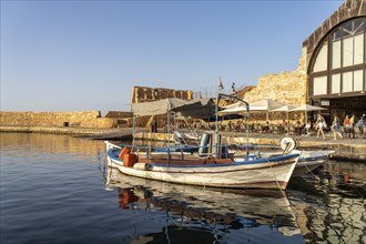 Fishing boat at the old Venetian harbour, Chania, Crete, Greece, Europe