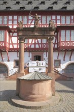 Ornamental fountain with Justitia at the Altstädter Markt in front of the Deutsches