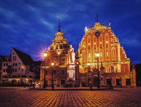 Vintage retro effect filtered hipster style image of Riga Town Hall Square, House of the Blackheads